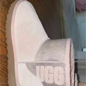 Pink glitter styled mini Ugg boots.